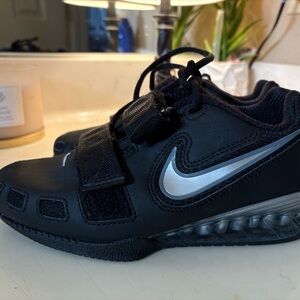 Woman’s Romaleos 2. Black and white Nike lifting shoes.